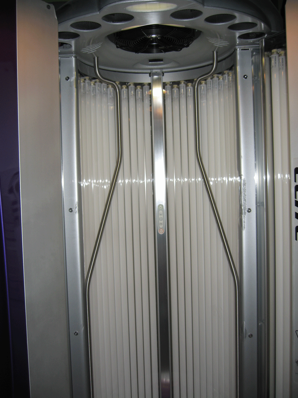 photo of acrylic lamp covers for a stand up tanning booth